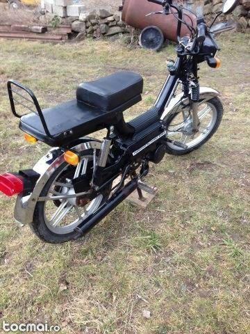 moped aproape nou